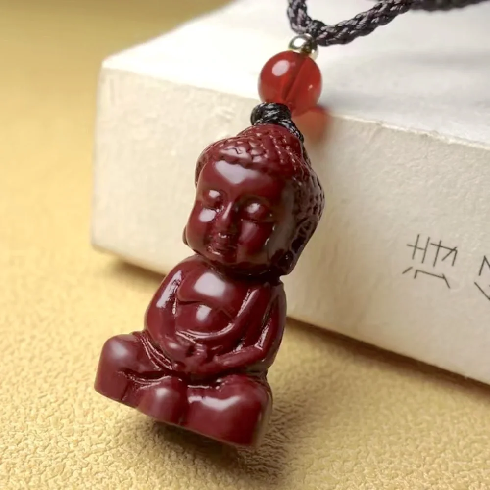 Cinnabar carved Buddha
